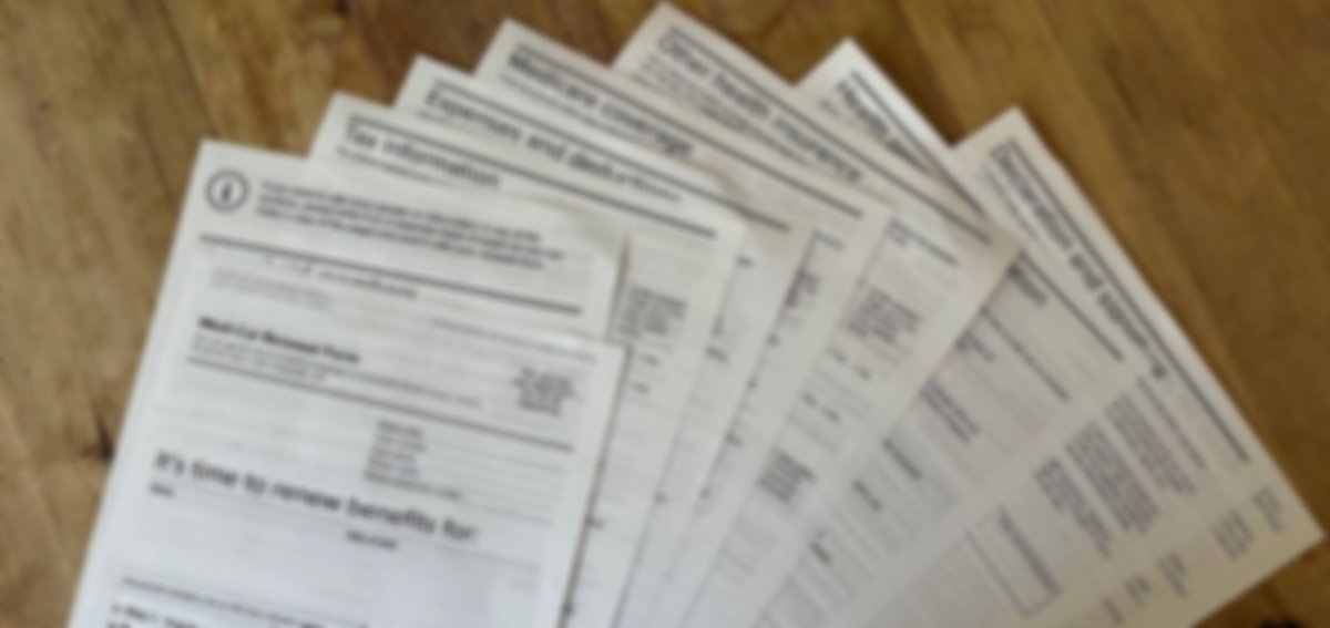 Various documents spread on a table